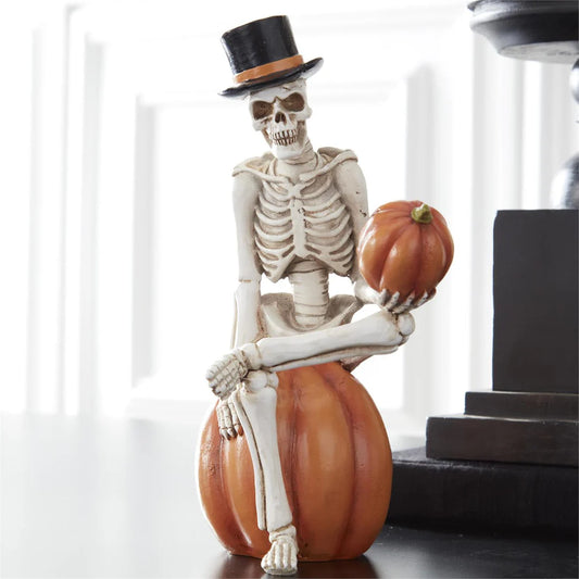 Skeleton Man Resting on Pumpkin